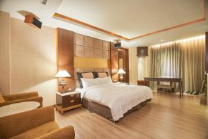 Voodi või voodid majutusasutuse Dongfeng Motel toas