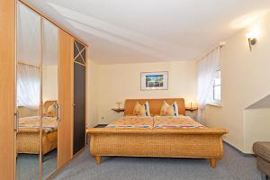 Postel nebo postele na pokoji v ubytování Elbresidenz am Nationalpark