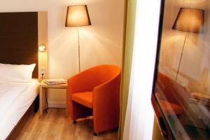 Postel nebo postele na pokoji v ubytování Apartmenthotel Kaiser Karl