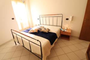 Posteľ alebo postele v izbe v ubytovaní Casa vacanze clio centro Otranto, Salento 6 posti