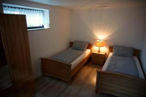 Postel nebo postele na pokoji v ubytování Ferienwohnung Liebeskind