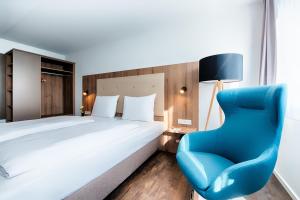 ACHAT Hotel Stuttgart Zuffenhausen 객실 침대
