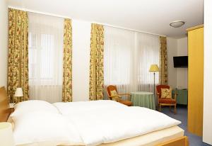 Postelja oz. postelje v sobi nastanitve Hotel Haus Bauer