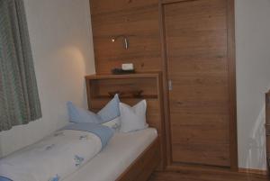 Postel nebo postele na pokoji v ubytování das Luggi Appartements