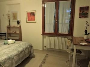Postel nebo postele na pokoji v ubytování Home Meditamondo