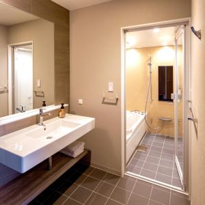 Ванная комната в HOTEL SOSHA