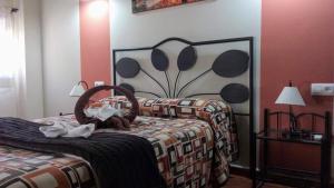 En eller flere senge i et værelse på Casa rural Alojamiento Garganton