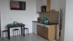 Kuchyňa alebo kuchynka v ubytovaní Apartament Pucka Przystań
