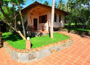Zahrada ubytování Eva Lanka Hotel - Beach & Wellness