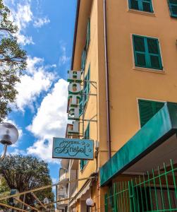 a sign on the side of a building at Hotel Bristol in Lavagna