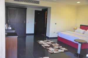 Uma cama ou camas num quarto em Best View Pyramids Hotel
