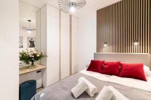 Posteľ alebo postele v izbe v ubytovaní Apartamenty Marron z sauną, bawialnią i widokiem na Skrzyczne - Dream Apart
