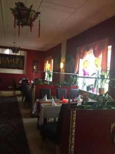 מסעדה או מקום אחר לאכול בו ב-Asiatisches Landhaus