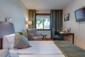 TV a/nebo společenská místnost v ubytování Hotel Bellevue