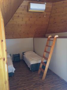 Postel nebo postele na pokoji v ubytování Vénusz Panzió és Vendéglő