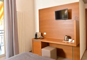 TV a/nebo společenská místnost v ubytování Piano Alto Rooms