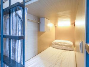 Postel nebo postele na pokoji v ubytování K2 Guesthouse Central