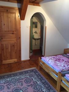 A bed or beds in a room at Agro privat