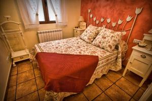 Łóżko lub łóżka w pokoju w obiekcie Casa Rural el Herrero de Pollos