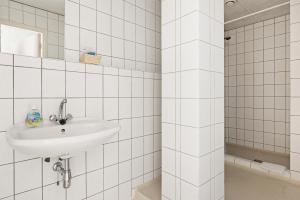 Ein Badezimmer in der Unterkunft Hotel de Waalehof