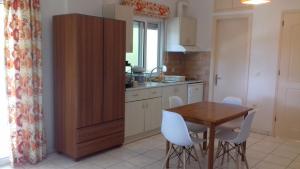Kuchyň nebo kuchyňský kout v ubytování Potokia Rooms