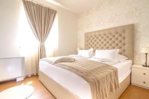 Krevet ili kreveti u jedinici u objektu Luxury Apartments Villa Luce