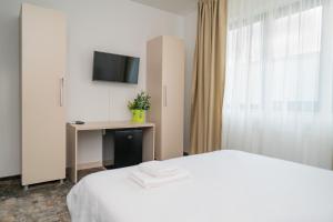 TV a/nebo společenská místnost v ubytování FOREST M,Constanta