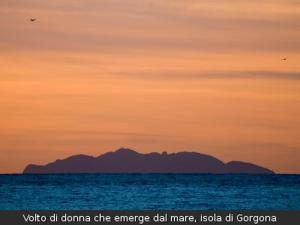 a sunset over the ocean with mountains in the background at Hotel Signorini in Castiglioncello
