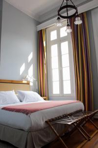 Postel nebo postele na pokoji v ubytování Zerohotel