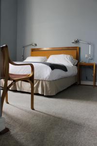 Postel nebo postele na pokoji v ubytování Zerohotel