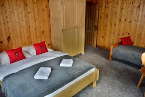 Posteľ alebo postele v izbe v ubytovaní Apartamenty Sosna