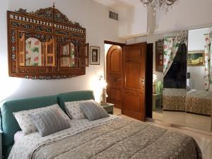 Un pat sau paturi într-o cameră la Olguita
