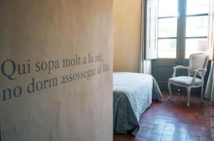 Een bed of bedden in een kamer bij BYPILLOW Cluc Begur