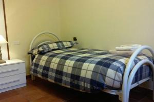 Ένα ή περισσότερα κρεβάτια σε δωμάτιο στο Charming Family Lodge With Private Garage