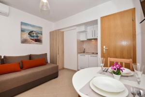 Kuchyň nebo kuchyňský kout v ubytování Apartman Mia