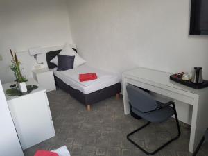 Giường trong phòng chung tại Pension Am Stadtrand