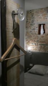 Postel nebo postele na pokoji v ubytování LO studiO B&B