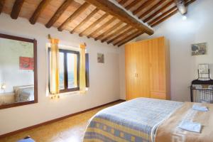Cama o camas de una habitación en Giaggiolo