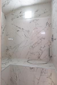 Koupelna v ubytování Domus Nannini SPA - L' Arco di Matteotti