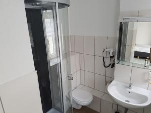 Phòng tắm tại Pension Am Stadtrand