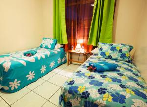 Uma cama ou camas num quarto em Farehau