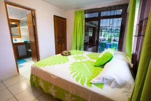Uma cama ou camas num quarto em Farehau