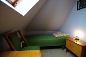 Łóżko lub łóżka w pokoju w obiekcie Morgenröte