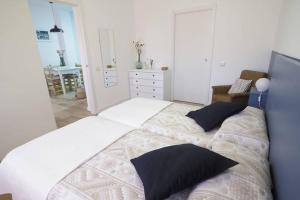 Postel nebo postele na pokoji v ubytování Apartaments Sa Calm Sant Miquel de les Formigues