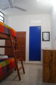 Voodi või voodid majutusasutuse Hostal Las Cruces toas