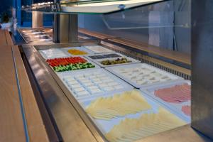 a display case with many different types of food at Kordistos Hotel in Kefalos