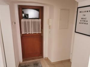 Telewizja i/lub zestaw kina domowego w obiekcie Zentrale, ruhige Wohnung nahe Murinsel & Kunsthaus