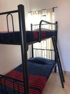 Postel nebo postele na pokoji v ubytování Hostel Inn