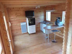 Kuchyň nebo kuchyňský kout v ubytování Chalet 3 étoiles entre ville et verdures