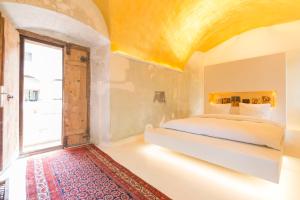 سرير أو أسرّة في غرفة في Chateau Třebešice
